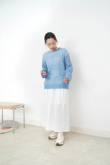 10% wool blue loose cut swaeater in ripped fringe