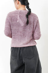 Pink wool yarn cardigan in gradient color