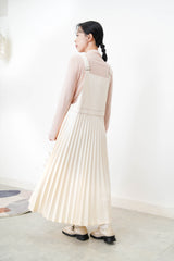 Cream worker pleats skirt with red outline stitches