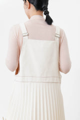 Cream worker pleats skirt with red outline stitches