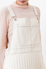 Cream worker pleats skirt with red outline stitches