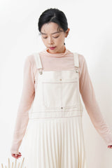 Cream worker pleats skirt with red outline stitches