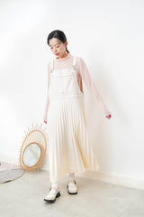 Cream worker pleats skirt with red outline stitches