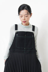 Black worker pleats skirt w/ red outline stitches