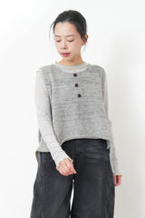 Grey knit vest w/ ripped hem