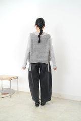Grey knit vest w/ ripped hem