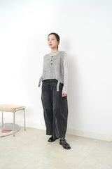 Grey knit vest w/ ripped hem