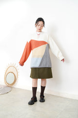 Orange palette sweater in loose cut