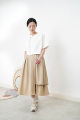 Beige A cut skirt in detail cut out layering