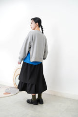 Grey pullover in asymmetrical 3D cut