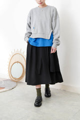 Grey pullover in asymmetrical 3D cut