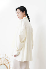 Cream long shirt with contrast patchwork pockets