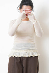 Ivory thin top w/ peplum hem