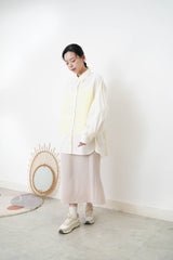 Cream long shirt with contrast patchwork pockets