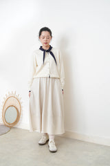 White knit cardigan w/ knot tie collar