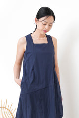 Navy square neck dress w/ asy. layering hem