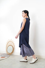 Navy square neck dress w/ asy. layering hem