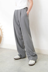 Grey suit pants w/ asy. waist cutting