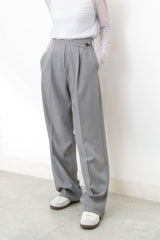 Grey suit pants w/ asy. waist cutting
