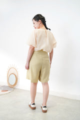 Mustard pleats shorts w/ overlap details