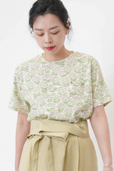 Pocket tee w/ green pants print