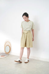 Pocket tee w/ green pants print