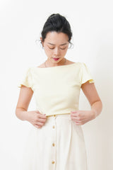 Yellow boat neck top w/ peplum sleeves