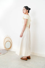 Yellow boat neck top w/ peplum sleeves