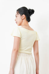 Yellow boat neck top w/ peplum sleeves