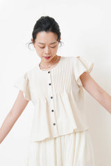 Beige pleats blouse w/ ruffle sleeves