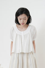 Ruffle blouse in crop cut
