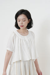 Ruffle blouse in crop cut