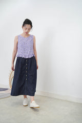 Purple vest in peplum hem