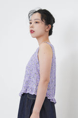 Black vest in peplum hem