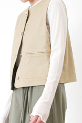 Beige pocket vest in worker style