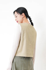 Beige pocket vest in worker style