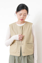 Beige pocket vest in worker style