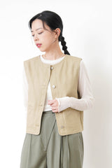 Beige pocket vest in worker style