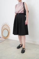 Pink high neck blouse in pleats shoulders