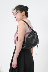 Pink high neck blouse in pleats shoulders