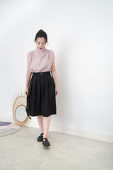 Pink high neck blouse in pleats shoulders