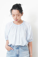 Blue pleats blouse in ruffle fringe