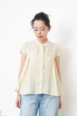 Yellow blouse in lace round neck