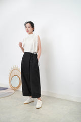 Ivory high neck blouse in pleats shoulders