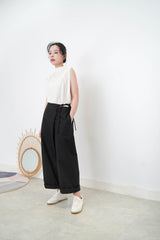 Ivory high neck blouse in pleats shoulders