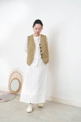 Beige vest w/ lace outlined details