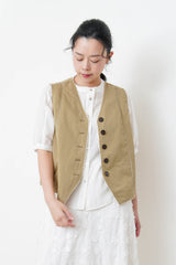 Beige vest w/ lace outlined details