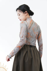 Green marble print turtle neck top