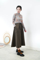 Green marble print turtle neck top