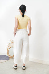Pastel yellow minimal vest with crop sleeves